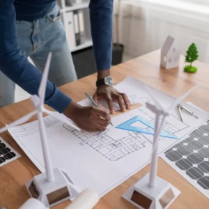 a guy designing a construction plan