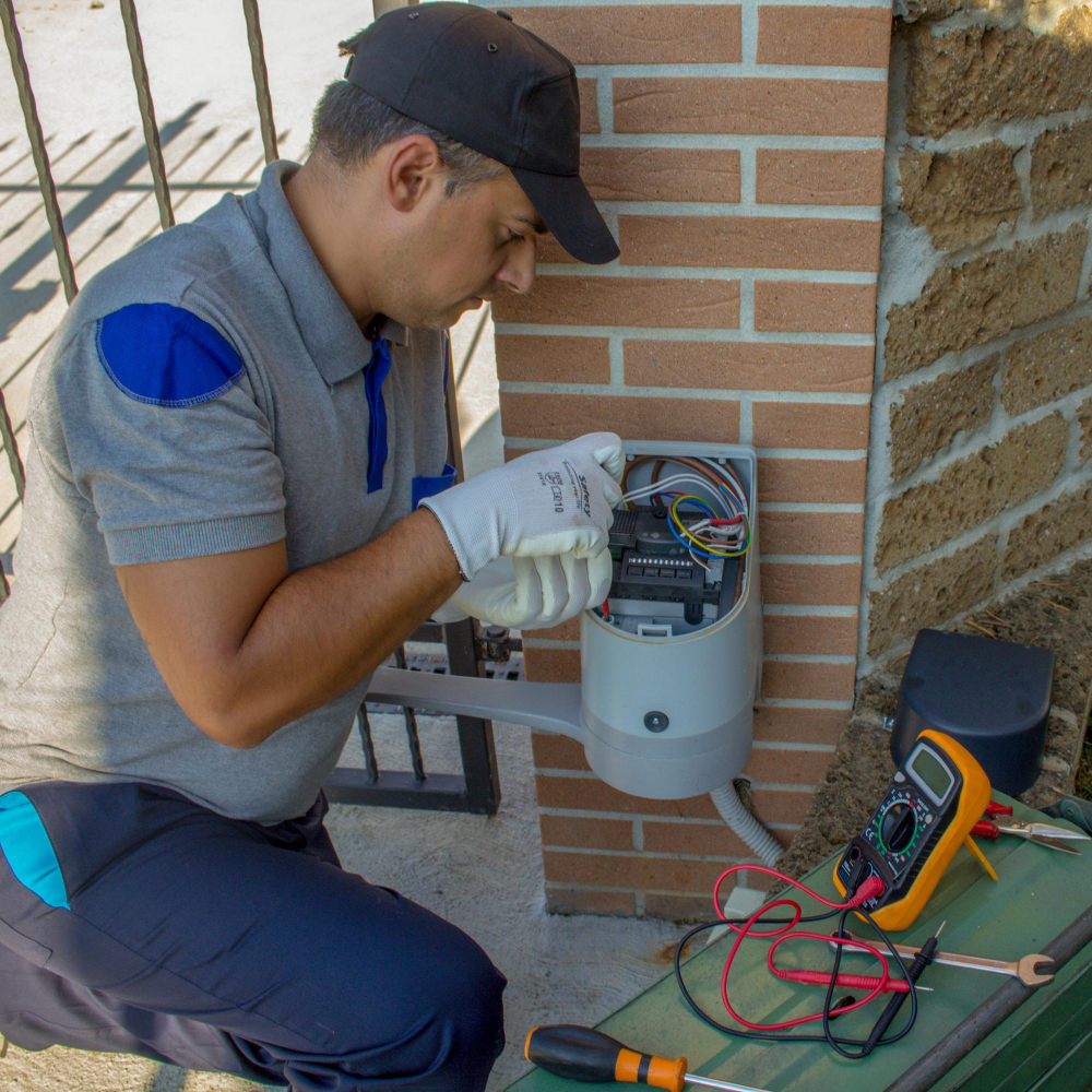 A guy doing electrical maintenance